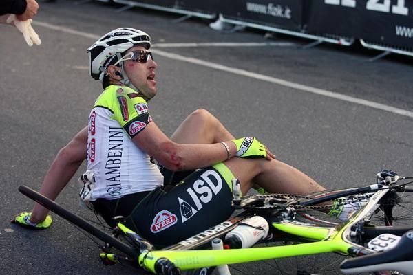 A bloodied Oscar Gatto (ISD - Neri) crashed in the sprint finale.
