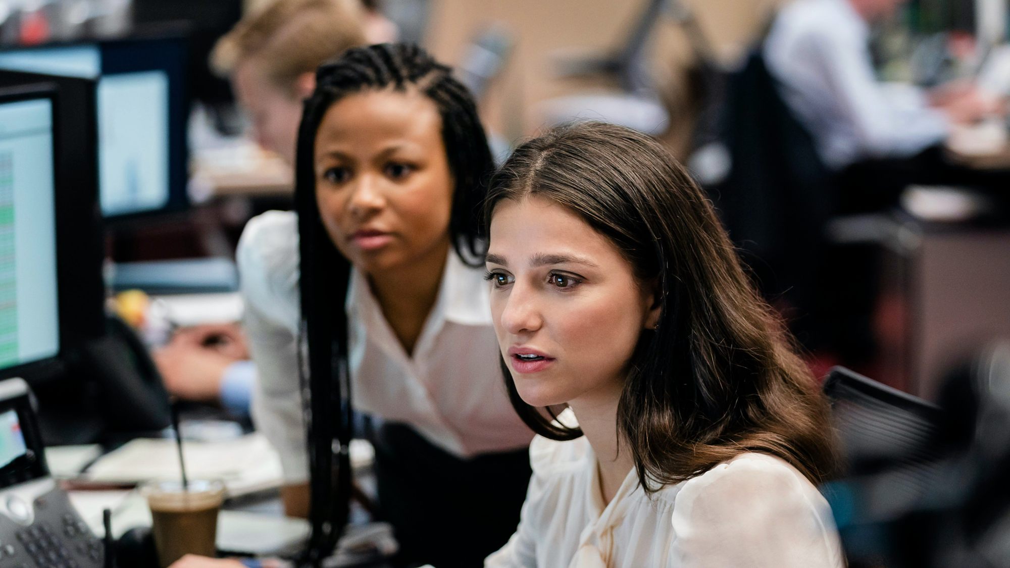 (L to R) Mihala Herold as Harper and Marisa Abella as Jasmine in Industry