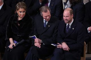 Grand Duchess Maria Teresa, Grand Duke Henri and Prince William sitting together at the Paris Notre Dame reopening in 2024