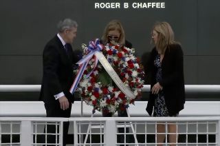NASA associate administrator Bob Cabana, Kennedy Space Center director Janet Petro and The Astronauts Memorial Foundation chair Sheryl Chaffee position a wreath dedicated to "Remembering Our Fallen Heroes" at the base of the Space Mirror Memorial in Florida on NASA's Day of Remembrance, Jan. 26, 2023.