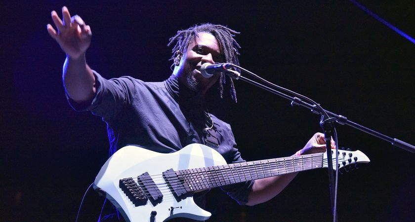 Tosin Abasi plays his 8-string Abasi Concepts Larada at a 2022 NAMM show