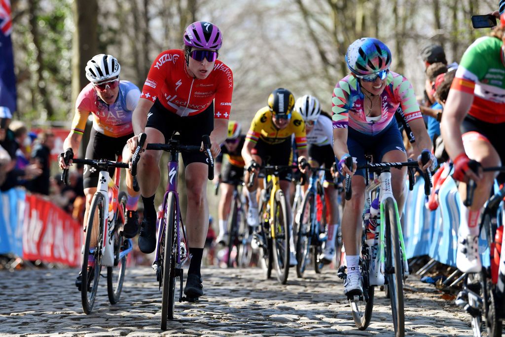 WEVELGEM BELGIUM MARCH 27 LR Marta Bastianelli of Italy and UAE Team Adq and Marlen Reusser of Switzerland and TeamSD Worx compete through Kemmelberg cobblestones sector during the 11th GentWevelgem In Flanders Fields 2022 Womens Elite a 159km one day race from Ypres to Wevelgem GWEwomen UCIWWT on March 27 2022 in Wevelgem Belgium Photo by Luc ClaessenGetty Images