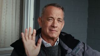 Tom Hanks as Otto Anderson, waving at the camera in movie A Man Called Otto