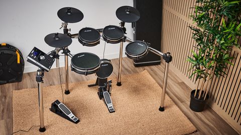 Alesis Command Mesh kit on a rug on a wooden floor