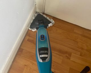 Image of Shark Genius Pocket Mop System being used to clean corners