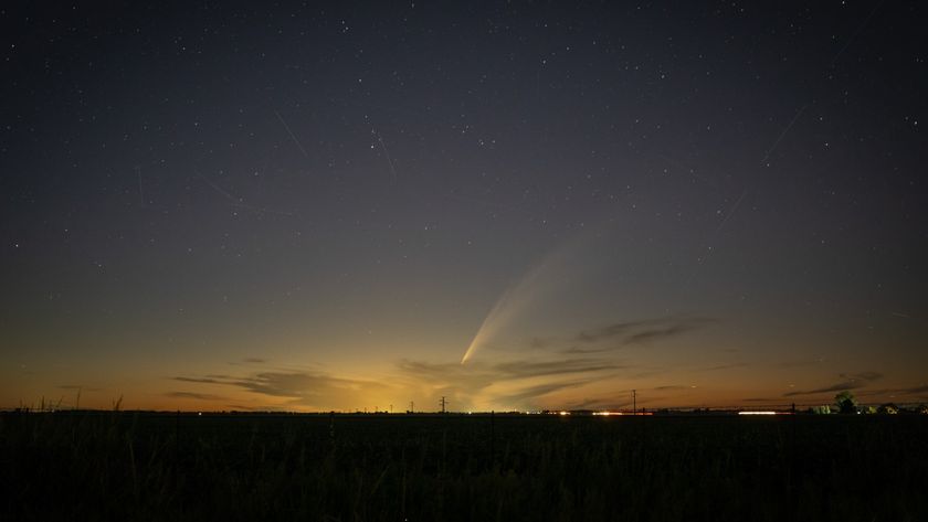 a fuzzy orange streak in a sunset sky