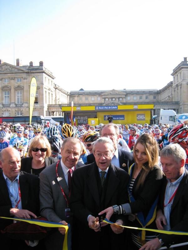 The local politicians cut the ribbon. The race can start