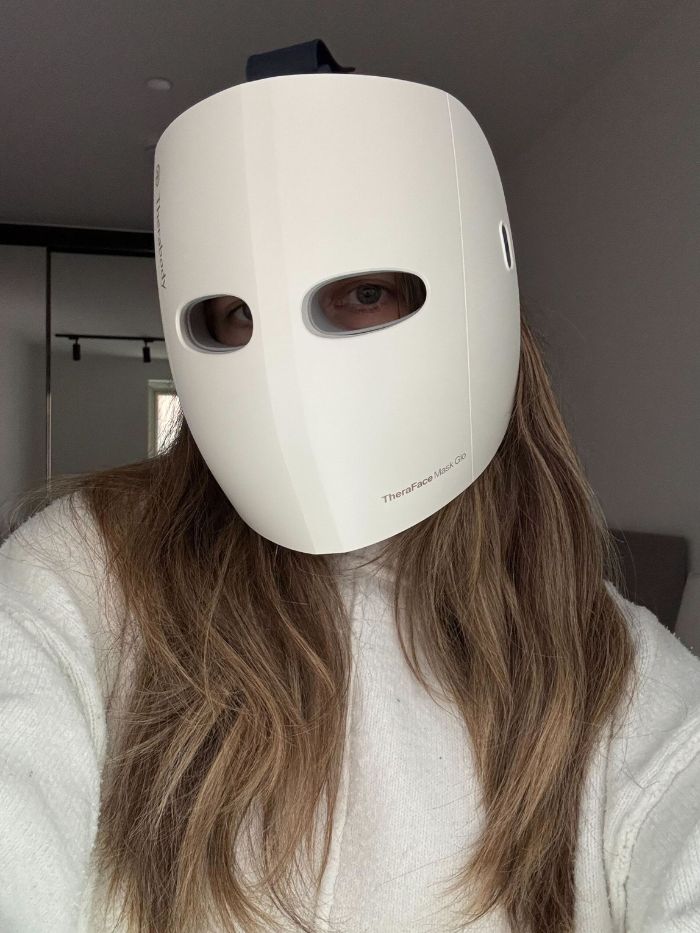 Deputy beauty editor Grace Lindsay testing the Therabody TheraFace Mask Glo