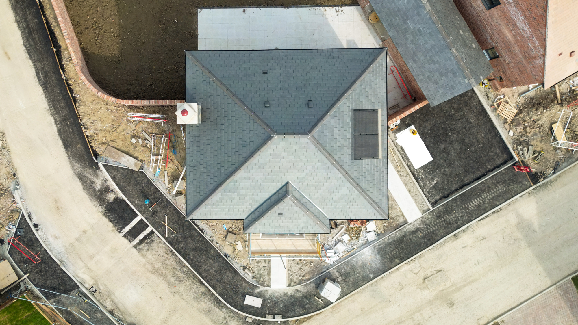 house being built on corner plot