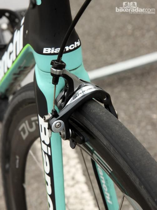 The Shimano Dura-Ace brake calipers are set up with the quick-release levers in the open position in case a neutral wheel with a narrower rim is required