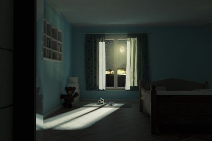 A child's bedroom at night.