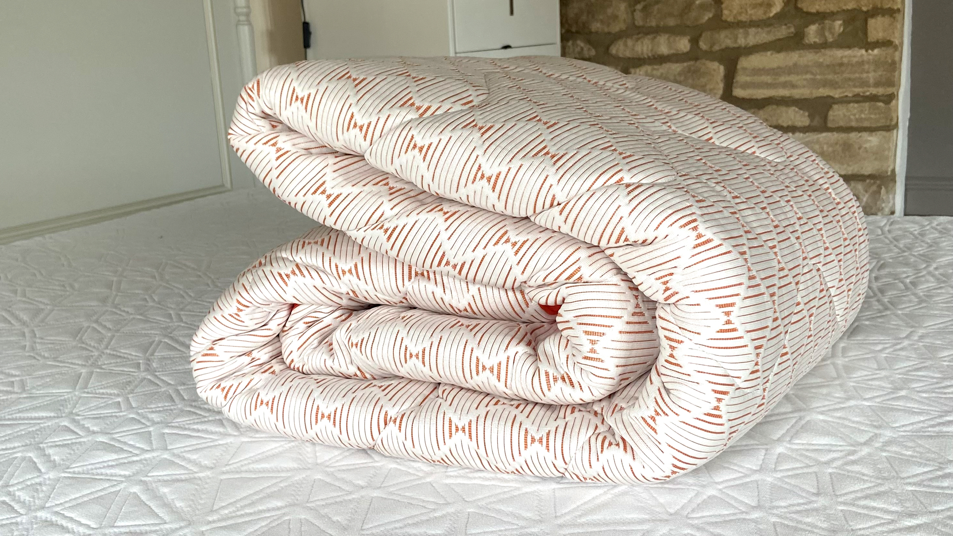The Silentnight Restore Cooling Copper Topper being tested at home on a bed