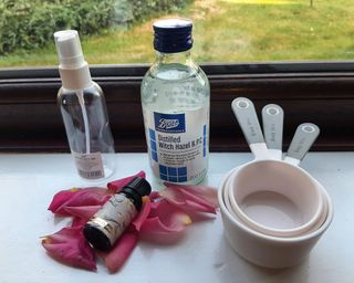 Ingredients needed to make a natural rose scented spray with added bourbon vanilla essential oil