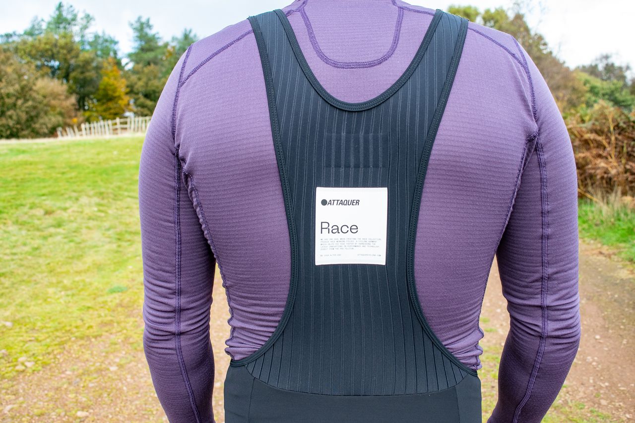 A cyclist wearing a pair of Attaquer Race bibtights