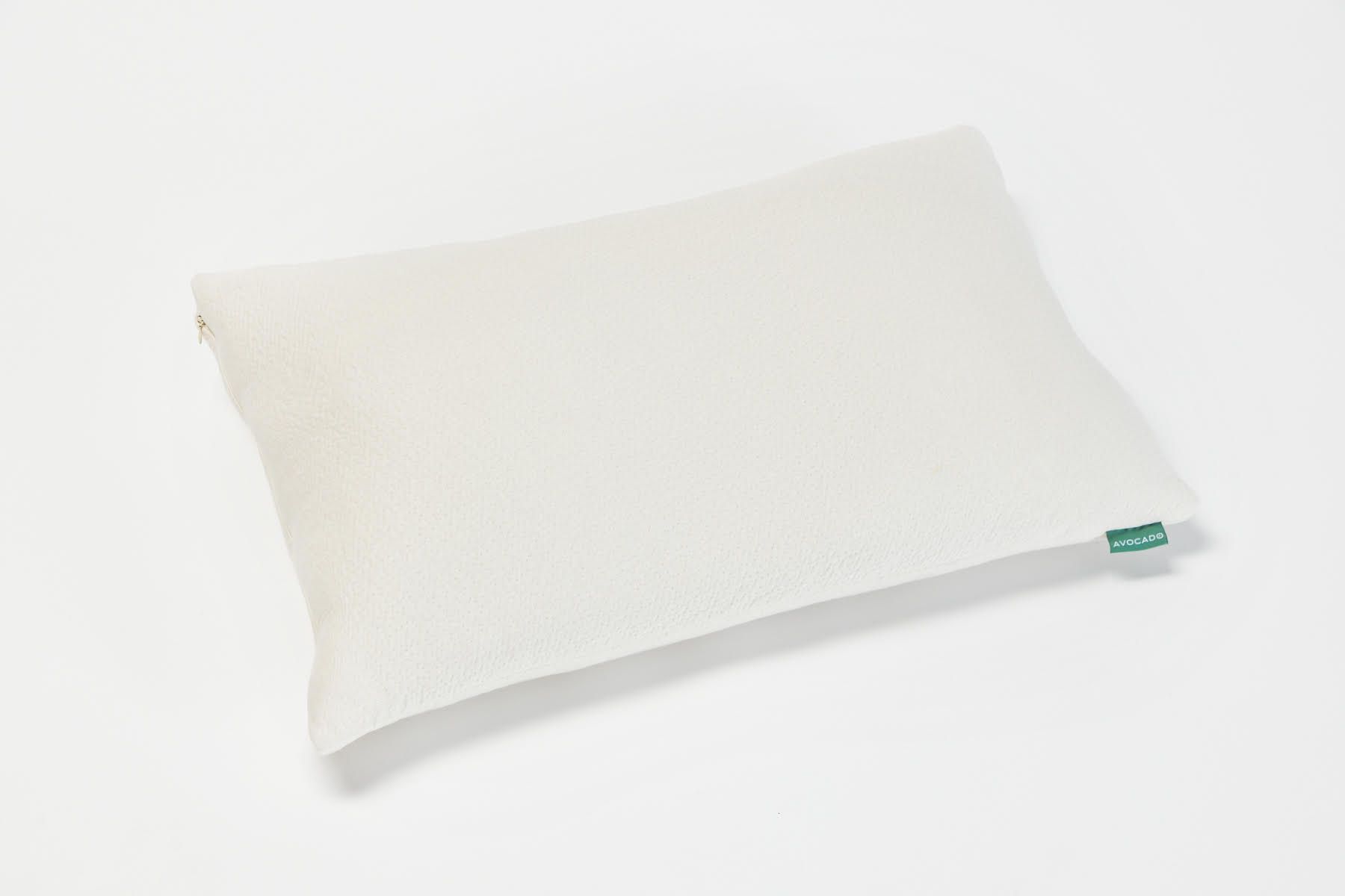 Best pillow: The Avocado Green Pillows in white with a green logo tag