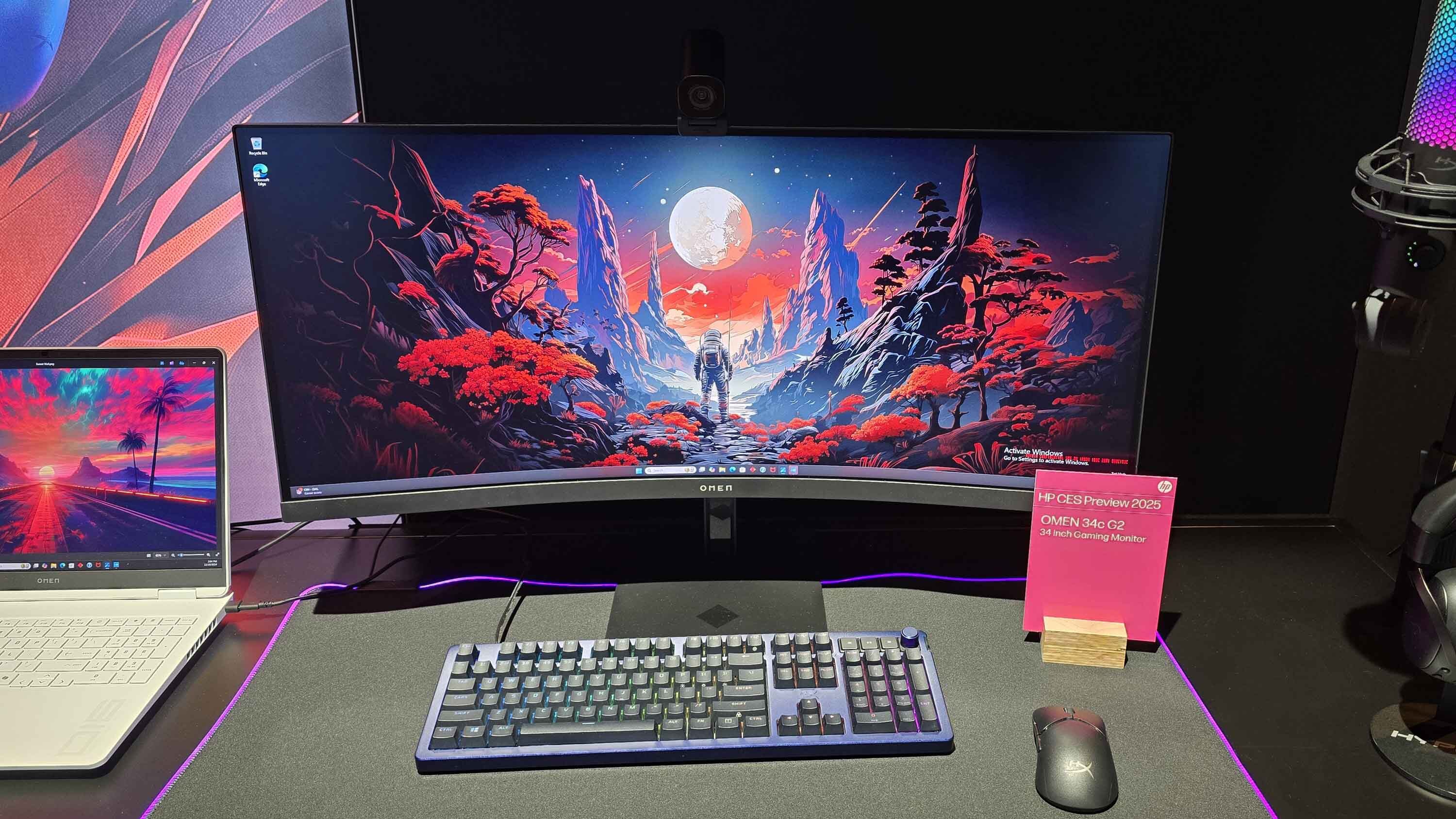 The HP OMEN 34c G2 on a desk.