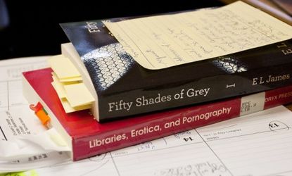 E. L. James' best-selling novel "Fifty Shades of Grey" sits on the desk of Gwinnett County Public Library's Deborah George, who wants her 15-branch library system in Georgia to yank the book 