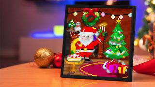 Divoom Pixoo-64 displaying a Christmas image