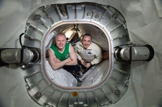 Expedition 65 Flight Engineers (from left) Oleg Novitskiy and Pyotr Dubrov are pictured inside BEAM, the Bigelow Expandable Activity Module.