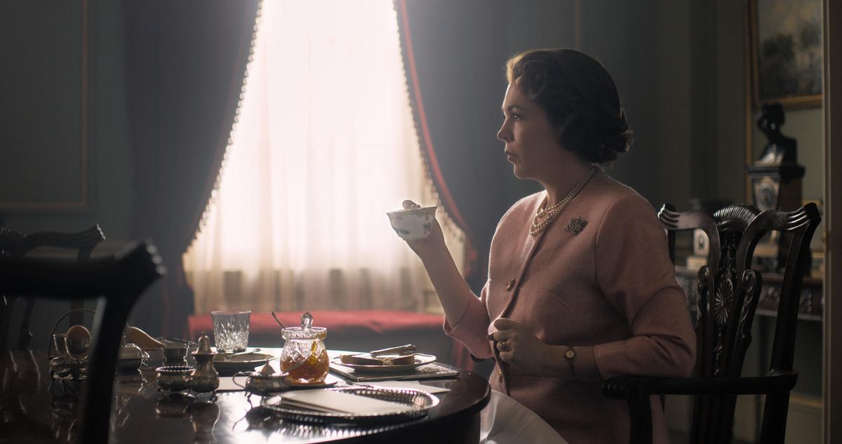 Olivia Colman enjoys tea as The Queen in The Crown season three