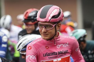 Team Sunweb rider Netherlands Wilco Kelderman wearing the overall leaders pink jersey looks on ahead of the new start of the 19th stage of the Giro dItalia 2020 cycling race a 258kilometer route between Morbegno and Asti on October 23 2020 Heavy rain has interrupted on October 23 2020 the 19th stage of the Giro dItalia following protests by the riders in the face of difficult weather conditions Todays stage was planned to be a flat 258km ride between Morbegno and Asti but was cut back 100km after riders revolted when faced with pelting rain in the northern region of Lombardy Photo by Luca Bettini AFP Photo by LUCA BETTINIAFP via Getty Images