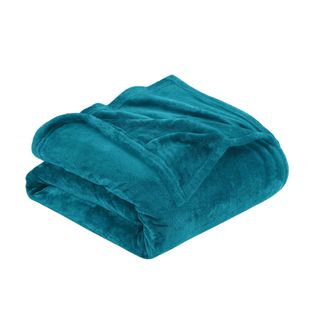 A teal colored fluffy blanket