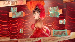 A promotional image for a Taylor Swift event, showing the singer dressed as a showgirl in a red, feathered outfit and an elaborate headdress, with text about "The Official Release Party of a Showgirl."