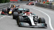 Mercedes driver Lewis Hamilton races against Red Bull’s Max Verstappen at the 2019 F1 Monaco GP