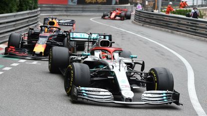 Mercedes driver Lewis Hamilton races against Red Bull’s Max Verstappen at the 2019 F1 Monaco GP