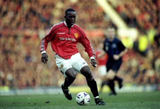 Dwight Yorke in action for Manchester United against Leeds United in 1998.