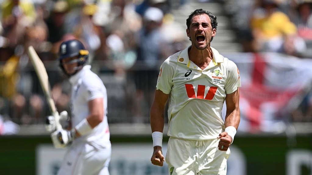 Australia bowler Mitchell Starc celebrates taking a wicket in the 1st Test Ashes victory over England 