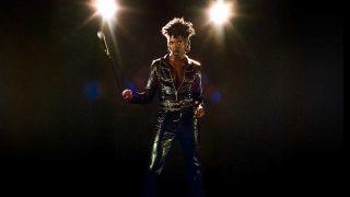 De'Wayne twirling a mic