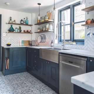 Navy kitchen with stainless steel sink