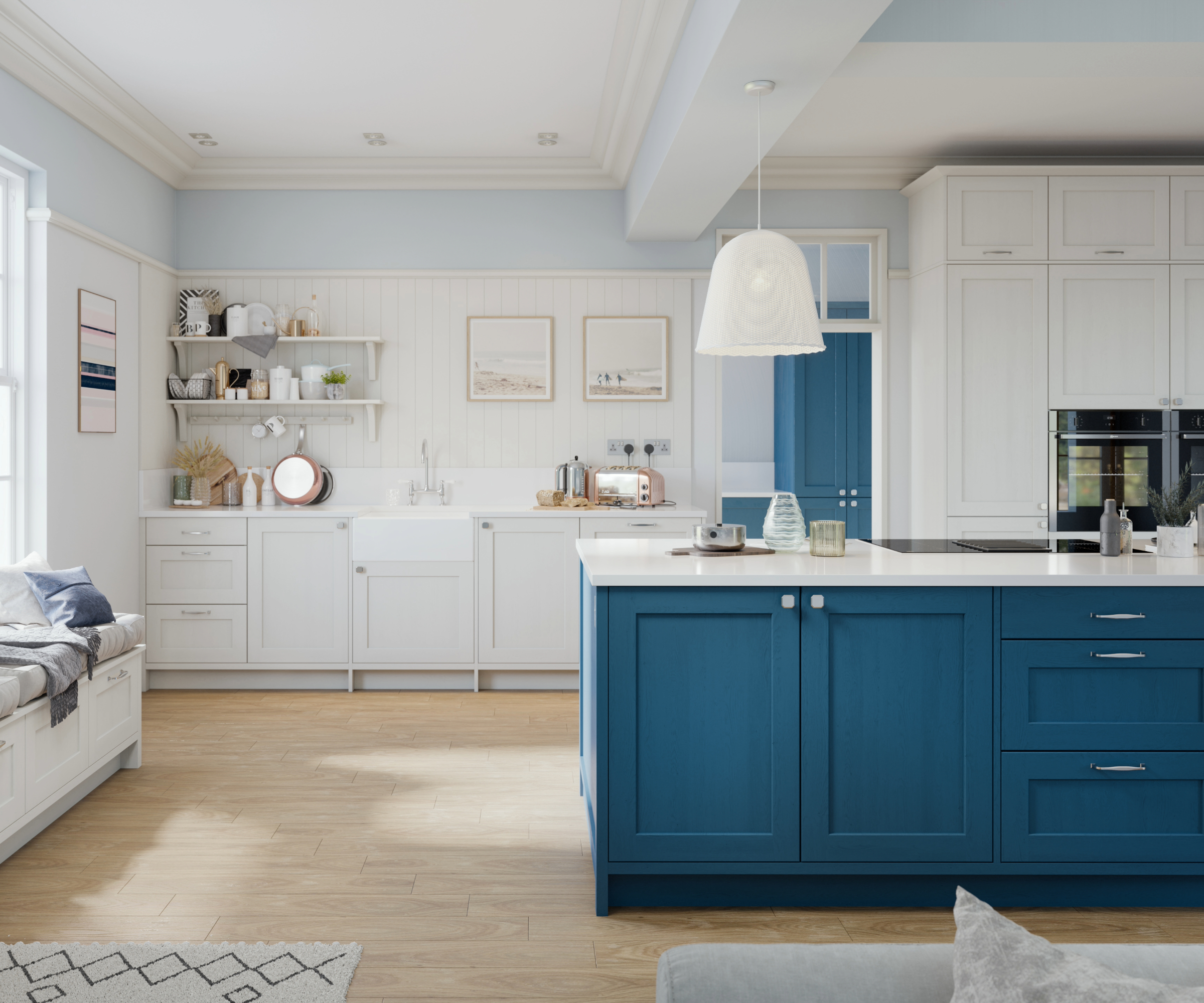 Kitchen with dark blue island and light blue upper walls