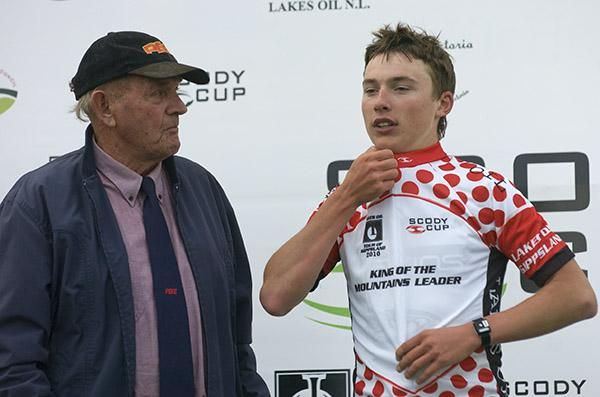 Patrick Lane (Team Jacyo Skins) tries on his polka dot jersey as the King of the Mountains competition leader after two stages.