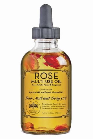 multi purpose oil with flower petals in it