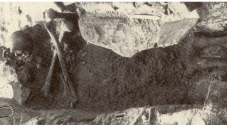 An 18th-century burial of a farmer, his femur bones placed in the shape of an X.