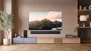 Lifestyle image showing a wall-mounted LG G5 OLED TV a living room environment