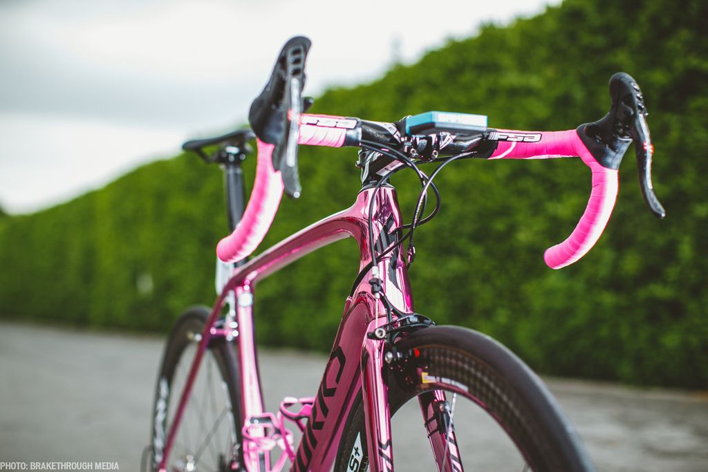 The blue SRM headunit stands out against the otherwise pink components and highlights