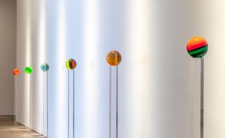 Coloured glass orbs on stands