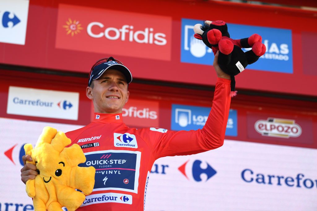MONTILLA SPAIN SEPTEMBER 02 Remco Evenepoel of Belgium and Team QuickStep Alpha Vinyl Red Leader Jersey celebrates at podium during the 77th Tour of Spain 2022 Stage 13 a 1684km stage from Ronda to Montilla 315m LaVuelta22 WorldTour on September 02 2022 in Montilla Spain Photo by Tim de WaeleGetty Images