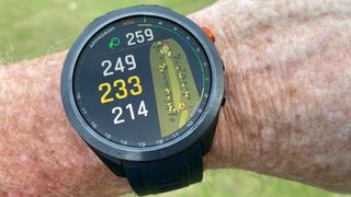 Garmin Approach S70 Golf Watch worn on the golf course showing off its display