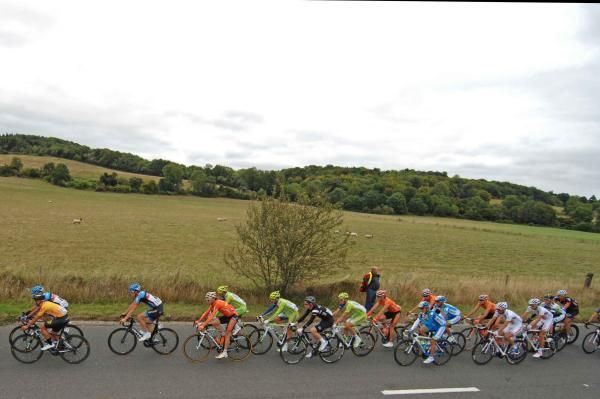 The yellow jersey toward the front of the bunch