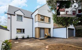 White rendered house remodel