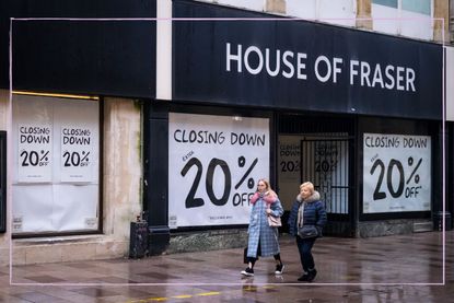 A House of Fraser shop with a closing down sign in the window