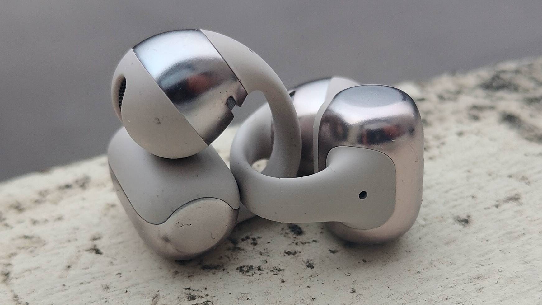 The Shokz OpenDots One on a white windowsill