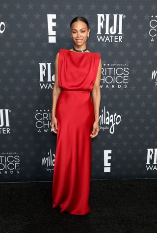 Zoe Saldana at the 2025 Critics Choice Awards wearing a red dress