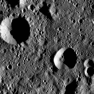 This image from NASA's Dawn spacecraft shows the cratered terrain inside the large Chaminuka Crater on the dwarf planet Ceres. Dawn took this image on Jan. 22, 2016, with NASA unveiling the view on April 22.