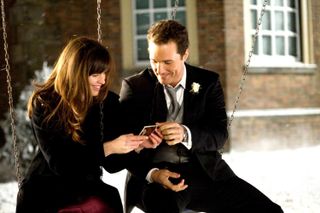 Jennifer Garner and Matthew McConaughey sit on a swing out in the snow in 'Ghosts of Girlfriends Past'