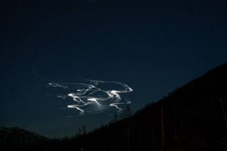 colorful wisps of light in the night sky